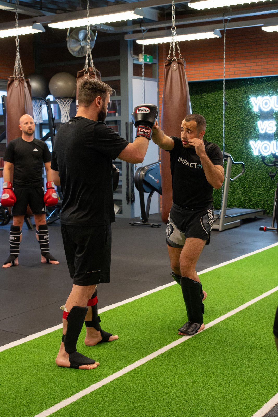 Kickbokstraining op pads bij Impact:45